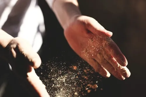 Man dusting off
